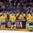 MINSK, BELARUS - MAY 11: Sweden's Joakim Lindstrom #12 high fives the bench after scoring Team Sweden's third goal of the game during preliminary round action at the 2014 IIHF Ice Hockey World Championship. (Photo by Richard Wolowicz/HHOF-IIHF Images)

